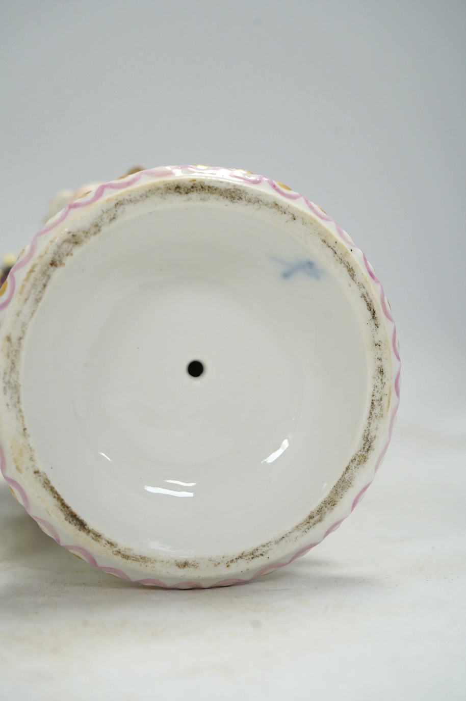 A pair of Potschappel porcelain floral encrusted vases and covers, 31cm high. Condition - poor